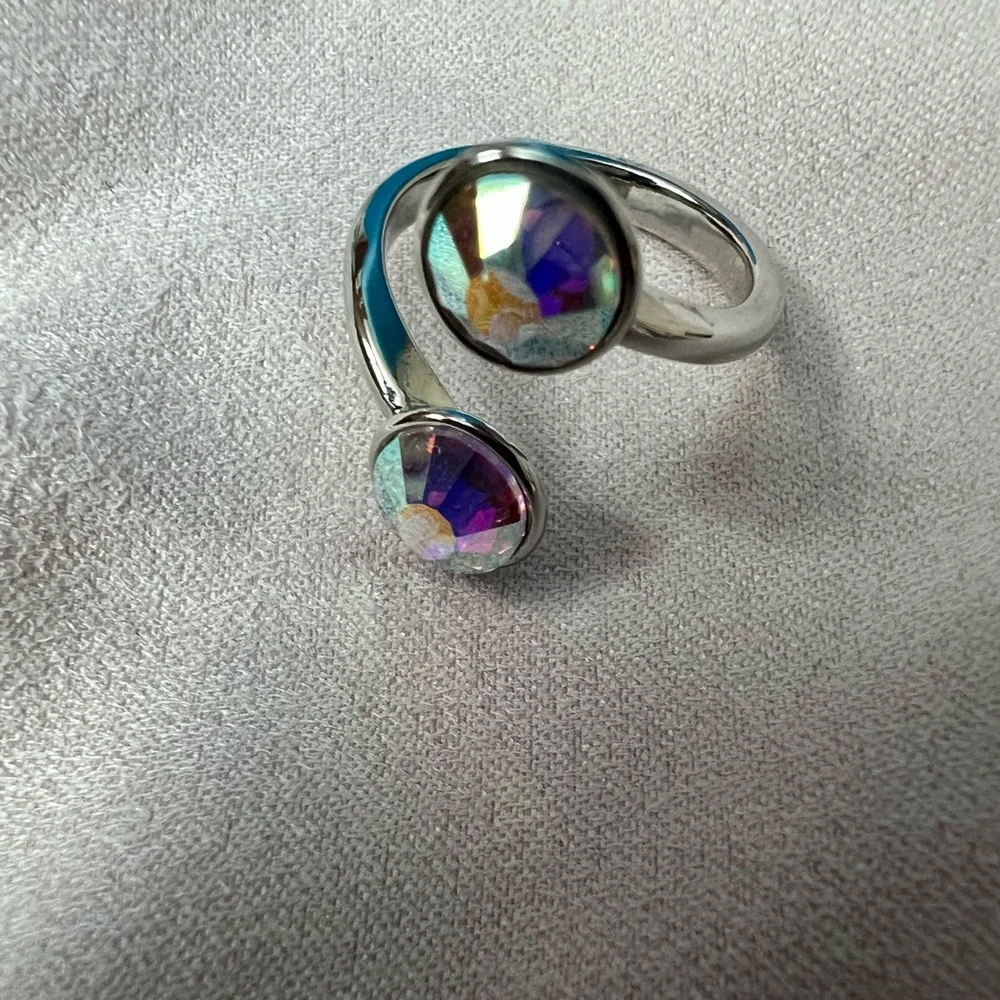 Curled up ring with two Swarovski crystals in Aurore Boreale fits size 6-7 BNIB